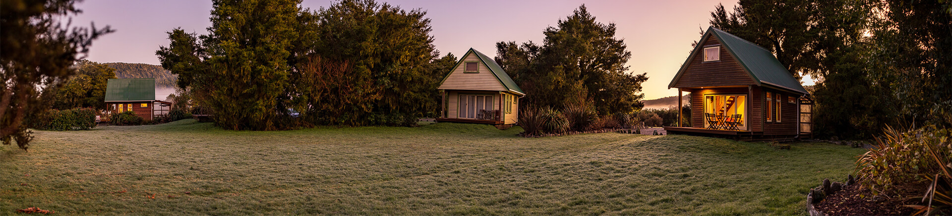 Panoramic of 3 chalets at sunset