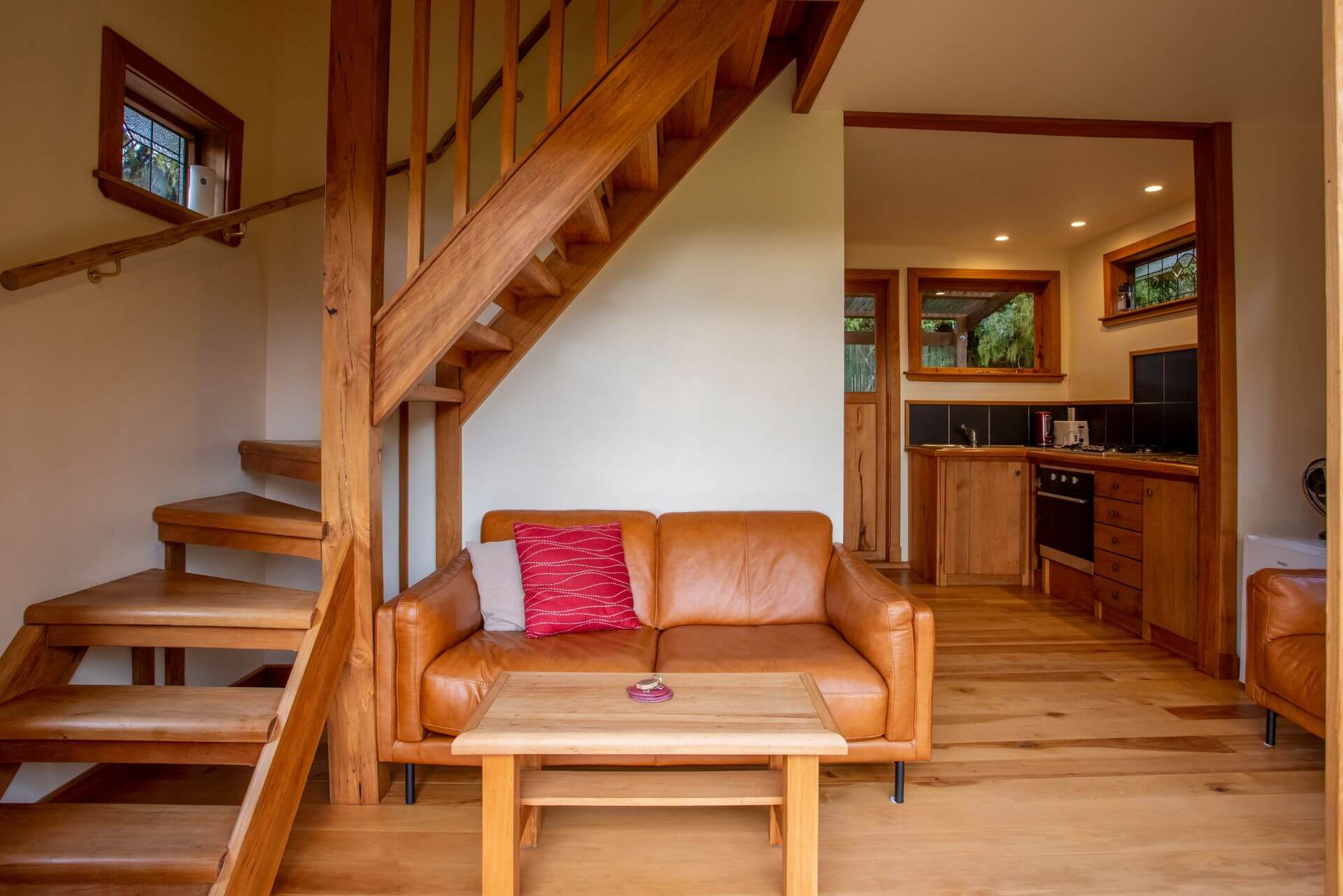 Interior seating and stairs of Kahere Chalet